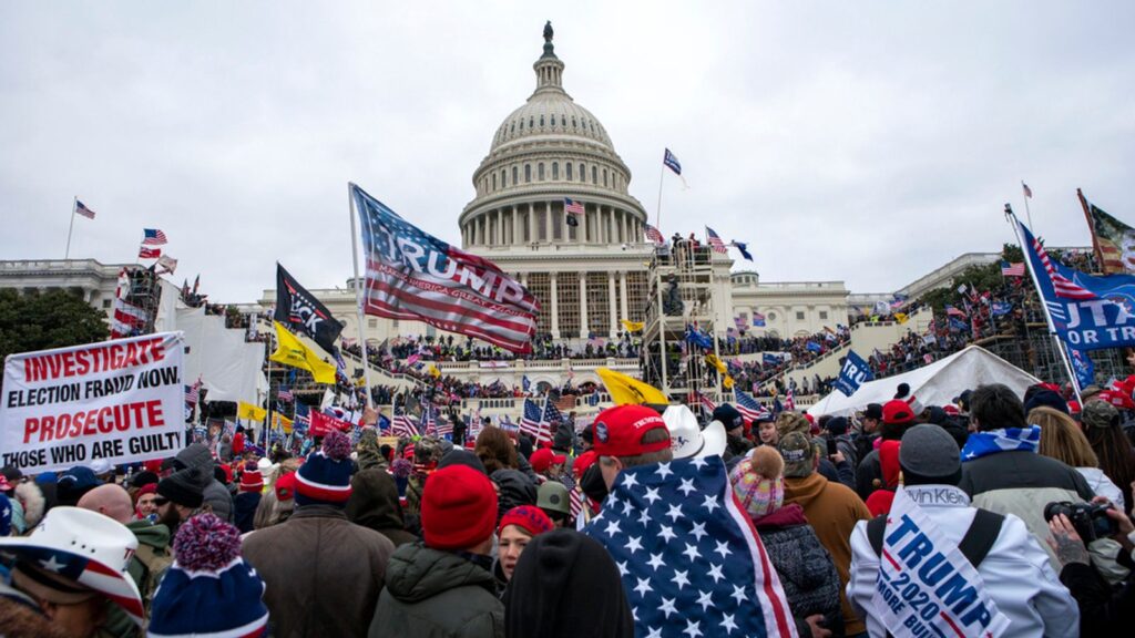 FILE - Rioters loyal to President Donald Trump rally at the U.S. Capitol in Washington, Jan. 6, 2021. (AP Photo/Jose Luis Magana, File)