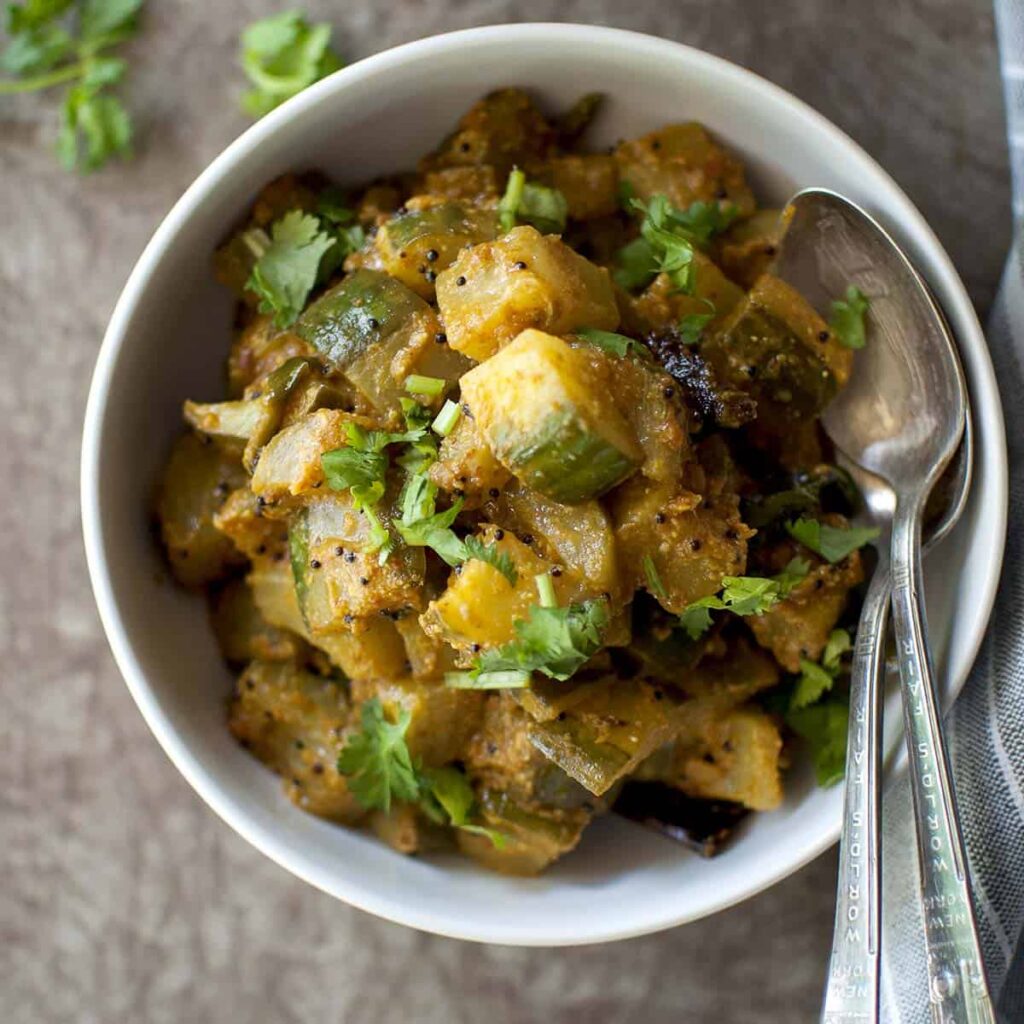 White bowl with cucumber chutney