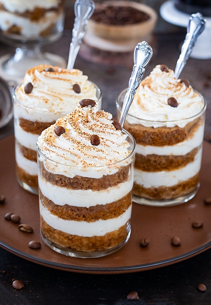 Eggless Tiramisu Trifle Cups on a brown plate