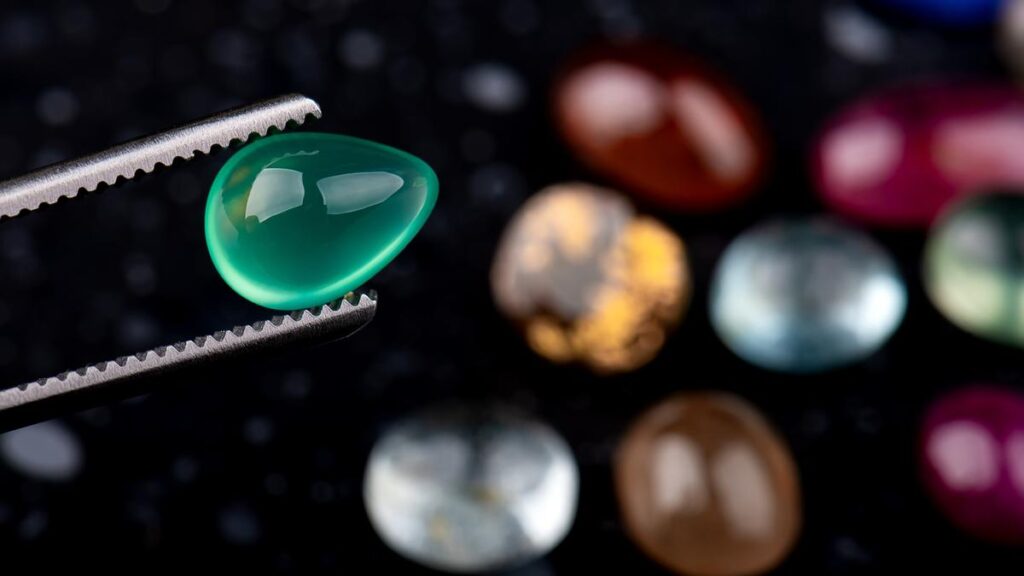 Rubies and emeralds get their colours from a common metal