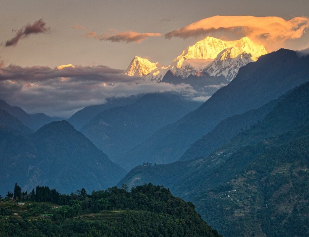 Sikkim places to visit: Top Attractions: Stunning Sunrise over Snow-covered Mt Kanchenjunga, Amazing Glacier lakes with turquoise waters, lush Himalayan hills and a unique culture