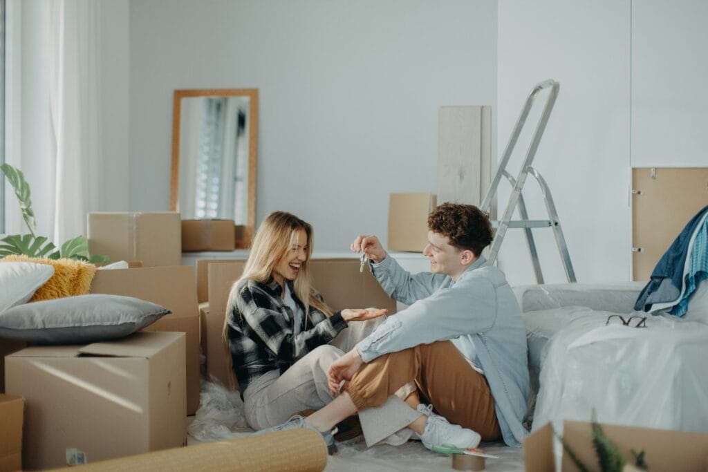 a couple after buying a new home