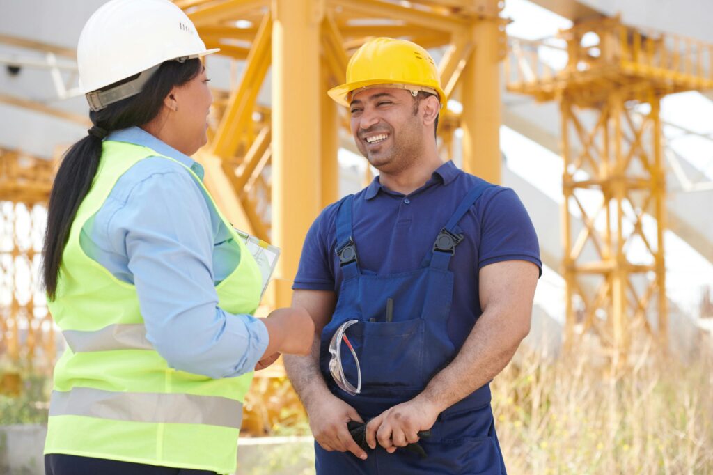 Man and Woman at a Construction Job Site