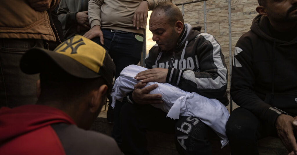 After Israeli Strike Kills More Than 400, Palestinians Tally the Dead