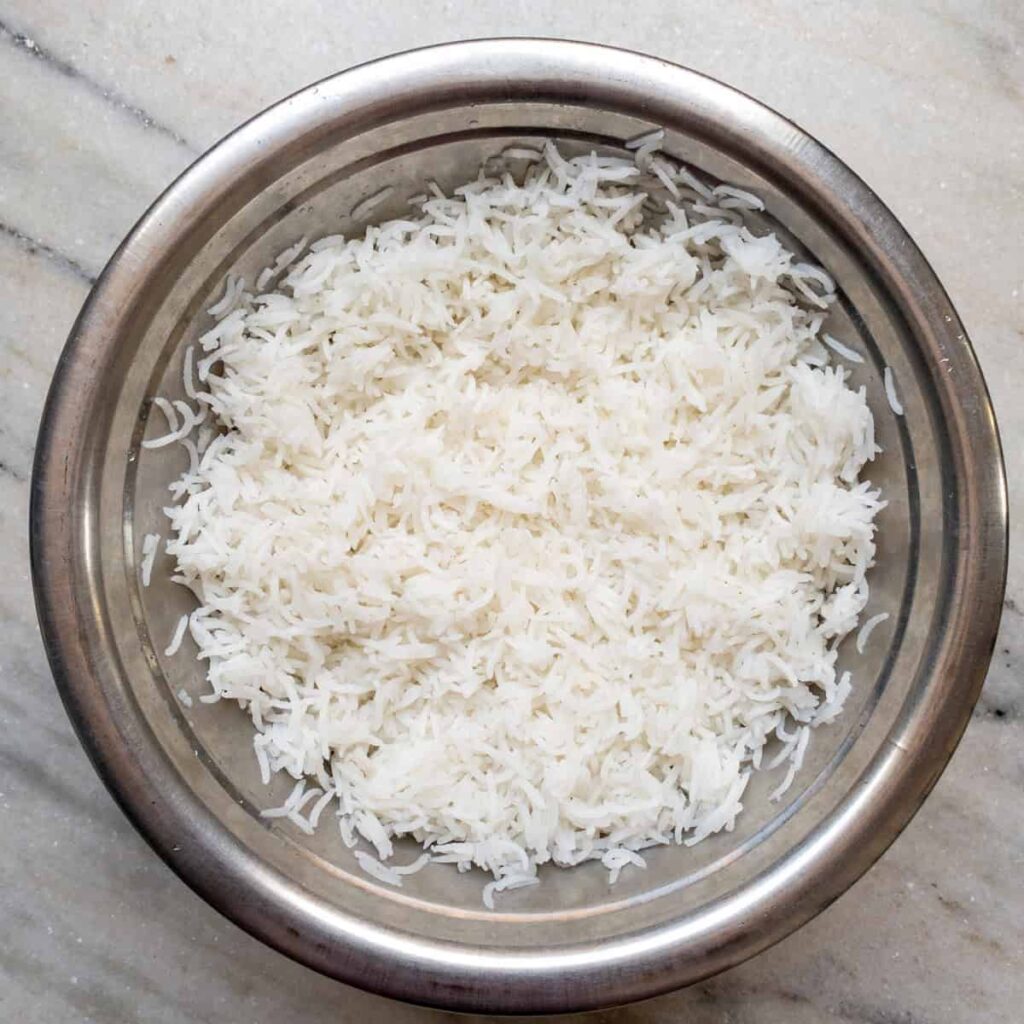A bowl of fluffy, perfectly cooked boiled basmati rice.