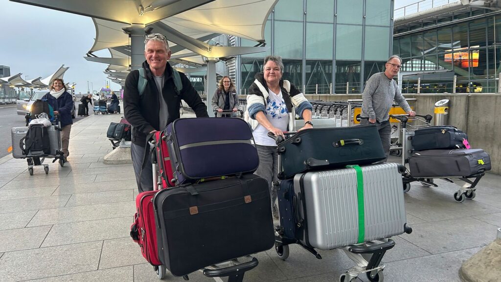 Passengers arrive at Heathrow Airport as flights resume. Pic: AP