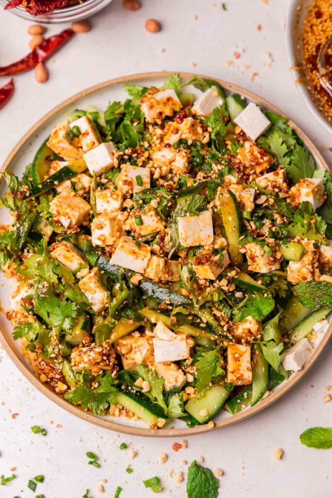 Asian cucumber salad served on a white platter ready to be eaten