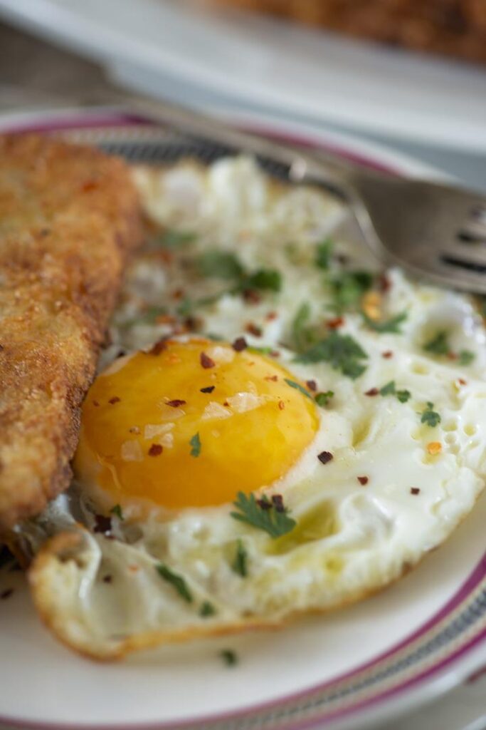 fried egg served with hash brown