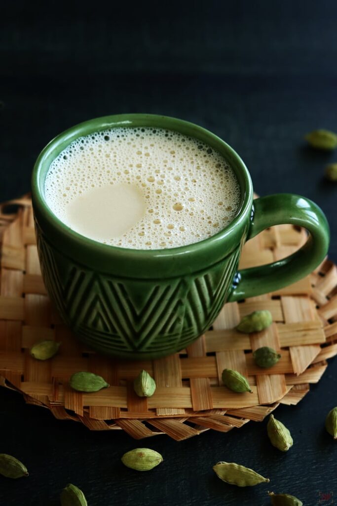 cardamom milk served in green mug