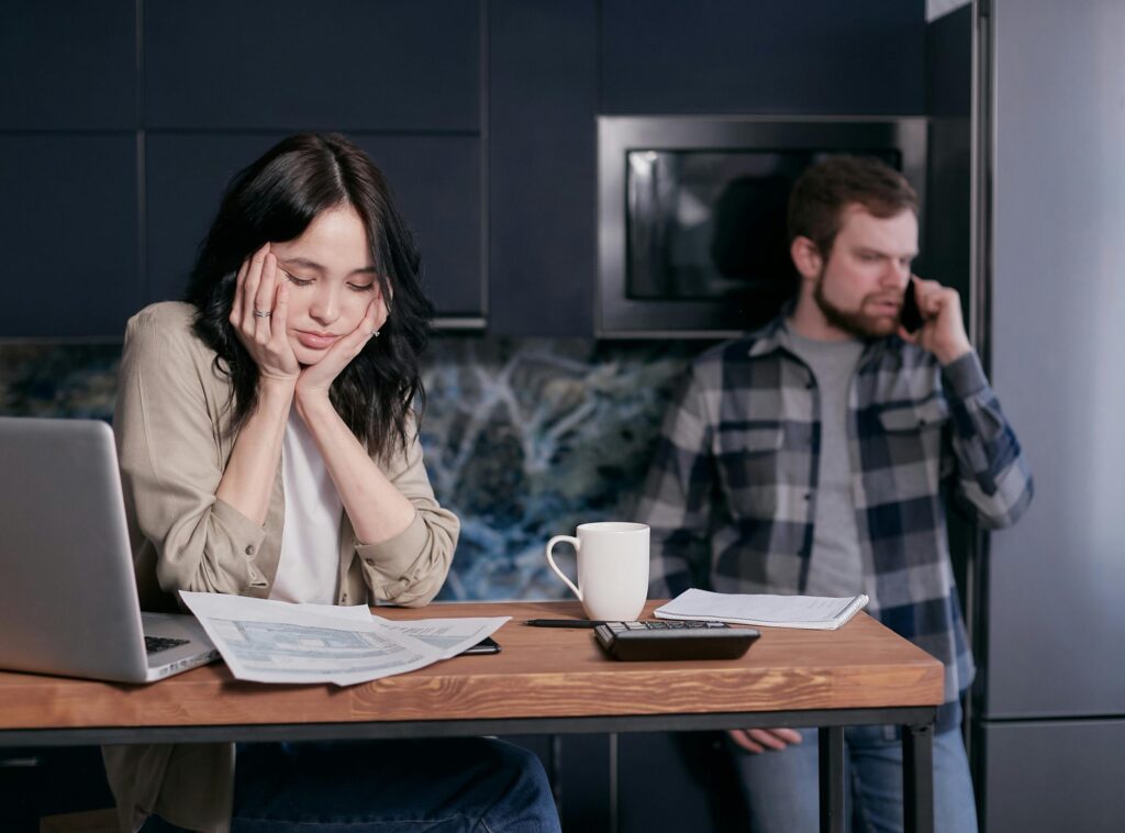 Woman and Man Dealing with Technology Issues